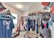 Walk-in closet with organized storage solutions and plenty of hanging space at 16815 Trite Bend St, Wimauma, FL 33598