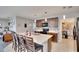 Spacious kitchen with island seating, ample counter space, and walk-in pantry at 16815 Trite Bend St, Wimauma, FL 33598
