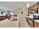 Bright kitchen flows into the living room, perfect for entertaining and Gathering gatherings at 16815 Trite Bend St, Wimauma, FL 33598