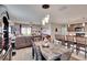 Bright living room flows into the dining area, perfect for entertaining and Gathering gatherings at 16815 Trite Bend St, Wimauma, FL 33598