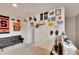 Loft on second floor with a couch and many wall decorations at 16815 Trite Bend St, Wimauma, FL 33598