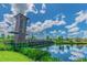 Community park features a wooden observation tower and scenic pond, perfect for outdoor recreation and relaxation at 1796 Tonka Ter, Wesley Chapel, FL 33543