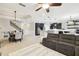 Open-concept living space connects the living room, dining area, and modern kitchen for easy entertaining at 1796 Tonka Ter, Wesley Chapel, FL 33543