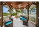 Cozy gazebo featuring stylish seating and scenic views, providing an ideal space for relaxation and outdoor gatherings at 19519 Gulf Blvd # 203, Indian Shores, FL 33785