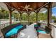 Inviting gazebo interior with comfortable seating and a ceiling fan, perfect for enjoying outdoor moments in style at 19519 Gulf Blvd # 203, Indian Shores, FL 33785