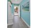 Coastal-themed entryway with charming decorations and a view to the outdoor scenery at 19519 Gulf Blvd # 203, Indian Shores, FL 33785