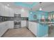 Modern kitchen with granite countertops, stainless appliances, and an open layout at 19519 Gulf Blvd # 203, Indian Shores, FL 33785