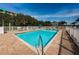 Beautiful swimming pool area with a jacuzzi and gazebo; a perfect spot for relaxation and recreation on a sunny day at 19519 Gulf Blvd # 203, Indian Shores, FL 33785