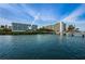 Waterfront view featuring private beach and condo buildings on the intercoastal at 19519 Gulf Blvd # 203, Indian Shores, FL 33785