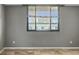 Cozy living space with tiled flooring and a window offering city views at 201 W Laurel St # 704, Tampa, FL 33602