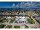 A waterfront community with canal access and boats docked steps away from residences at 2186 Edythe Dr # 11, Dunedin, FL 34698