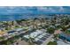 Stunning aerial view of the waterfront neighborhood and surrounding bay at 2186 Edythe Dr # 11, Dunedin, FL 34698