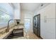 Updated kitchen with stainless steel appliances, granite countertops, and open layout at 2186 Edythe Dr # 11, Dunedin, FL 34698