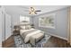 Bright bedroom with a ceiling fan, window, neutral decor and a queen-sized bed at 2207 S Carolina Ave # 7, Tampa, FL 33629