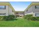 Well-maintained condo complex features lush green grass and mature landscaping creating a park-like setting at 2207 S Carolina Ave # 7, Tampa, FL 33629