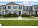 Charming townhome with well-manicured lawn and neat landscaping at 2432 Hearth Dr, Odessa, FL 33556