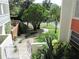 Condo grounds with well-manicured landscaping and a walkway at 2630 Pearce Dr # 208, Clearwater, FL 33764