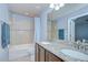 Bathroom with double sink and shower/tub combo at 2746 Birchcreek Dr, Wesley Chapel, FL 33544