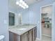 Bathroom with dual sinks and a linen closet at 2746 Birchcreek Dr, Wesley Chapel, FL 33544