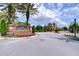Welcome to Silverleaf: Gated community entrance with brick signage and landscaping at 2746 Birchcreek Dr, Wesley Chapel, FL 33544