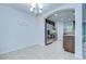 A classic dining area next to the kitchen with bright neutral color palette at 2746 Birchcreek Dr, Wesley Chapel, FL 33544