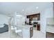 The kitchen is equipped with stainless steel appliances and granite countertops at 2746 Birchcreek Dr, Wesley Chapel, FL 33544