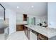 Modern kitchen boasting stainless steel appliances, granite countertops, and a center island at 2746 Birchcreek Dr, Wesley Chapel, FL 33544