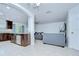 Modern kitchen with stainless steel appliances open to the living area at 2746 Birchcreek Dr, Wesley Chapel, FL 33544