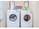 Laundry room with washer and dryer at 2746 Birchcreek Dr, Wesley Chapel, FL 33544