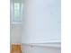 Bright staircase features wood floors and white railing leading to the upper level at 2746 Birchcreek Dr, Wesley Chapel, FL 33544