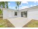 View of the back patio and sliding glass door access to the house at 2901 Forestwood Dr, Seffner, FL 33584