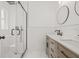 Modern bathroom with walk-in shower and double vanity at 2901 Forestwood Dr, Seffner, FL 33584