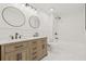 Updated bathroom boasts a double sink vanity and shower with sleek fixtures at 2901 Forestwood Dr, Seffner, FL 33584