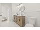 Modern bathroom featuring double vanity with marble countertop, tile floors, and a toilet at 2901 Forestwood Dr, Seffner, FL 33584