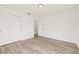 Clean bedroom features wood-look floors and a large closet for ample storage space at 2901 Forestwood Dr, Seffner, FL 33584
