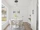 Dining area with round table and chairs with view of the window at 2901 Forestwood Dr, Seffner, FL 33584
