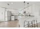 Contemporary kitchen boasts sleek cabinetry, stainless steel appliances, and stylish barstool seating at 2901 Forestwood Dr, Seffner, FL 33584