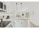 Kitchen area with granite countertops and stainless steel microwave at 2901 Forestwood Dr, Seffner, FL 33584