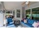 Outdoor living space with comfortable lounge seating and dining, perfect for enjoying time with guests at 3727 Wild Blossom Pl, Parrish, FL 34219