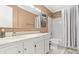 Cozy bathroom with tiled floor, white vanity, and shower-tub combo at 3823 N Oak Dr # K22, Tampa, FL 33611
