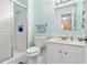 Bright bathroom with a tiled shower and updated vanity at 3823 N Oak Dr # K22, Tampa, FL 33611