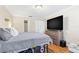 Well-lit bedroom featuring modern hardwood flooring and neutral paint at 3823 N Oak Dr # K22, Tampa, FL 33611