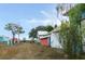 Several old outbuildings are surrounded by overgrown brush at 3940 E Knights Griffin Rd, Plant City, FL 33565