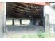 Interior of metal building featuring an open garage at 3940 E Knights Griffin Rd, Plant City, FL 33565