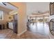 Partial view of the clubhouse interior showcases the dining area and a kitchenette perfect for preparing food and beverages at 402 Laurel Lake Dr # 104, Venice, FL 34292