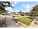 Enjoy the community amenities, including a pool, clubhouse, and a well-maintained bocce court at 402 Laurel Lake Dr # 104, Venice, FL 34292