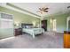 This is a spacious main bedroom with a walk-in closet and an ensuite bathroom at 4094 Windcrest Dr, Wesley Chapel, FL 33544