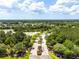 Aerial view of the neighborhood and the community entrance at 4260 Baudelaire Ct, Brooksville, FL 34604