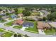 Residential community featuring well-manicured lawns, lush landscaping, and homes, creating a welcoming neighborhood at 4260 Baudelaire Ct, Brooksville, FL 34604