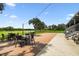 Charming brick patio with comfortable seating, ideal for enjoying outdoor dining and the golf course scenery at 4260 Baudelaire Ct, Brooksville, FL 34604